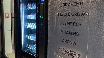 A shop for hemp products with a vending machine. The vending machine offers CBD, cosmetics, and vitamins.