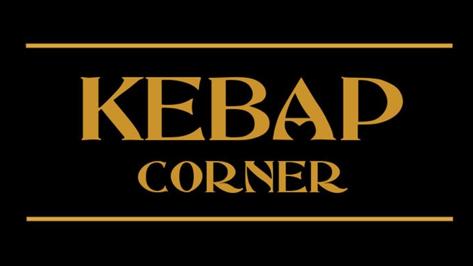 A black sign with golden lettering. It says "KEBAP CORNER".