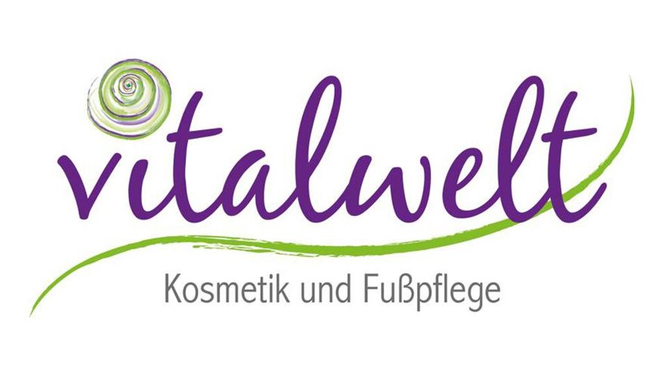 A logo of "vitalwelt" with the slogan "Cosmetics and Foot Care". The font is in purple with a green accent and a spiral.